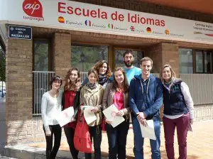 Some of our students who had the certification in front of the school with their teacher