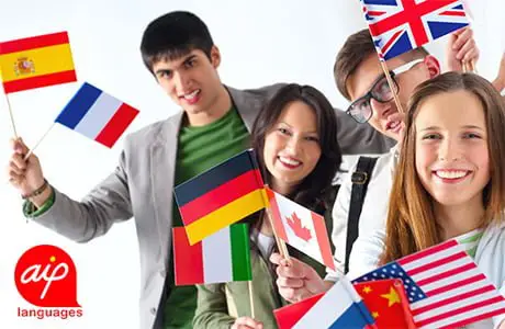 Students who hold different flags from all the world